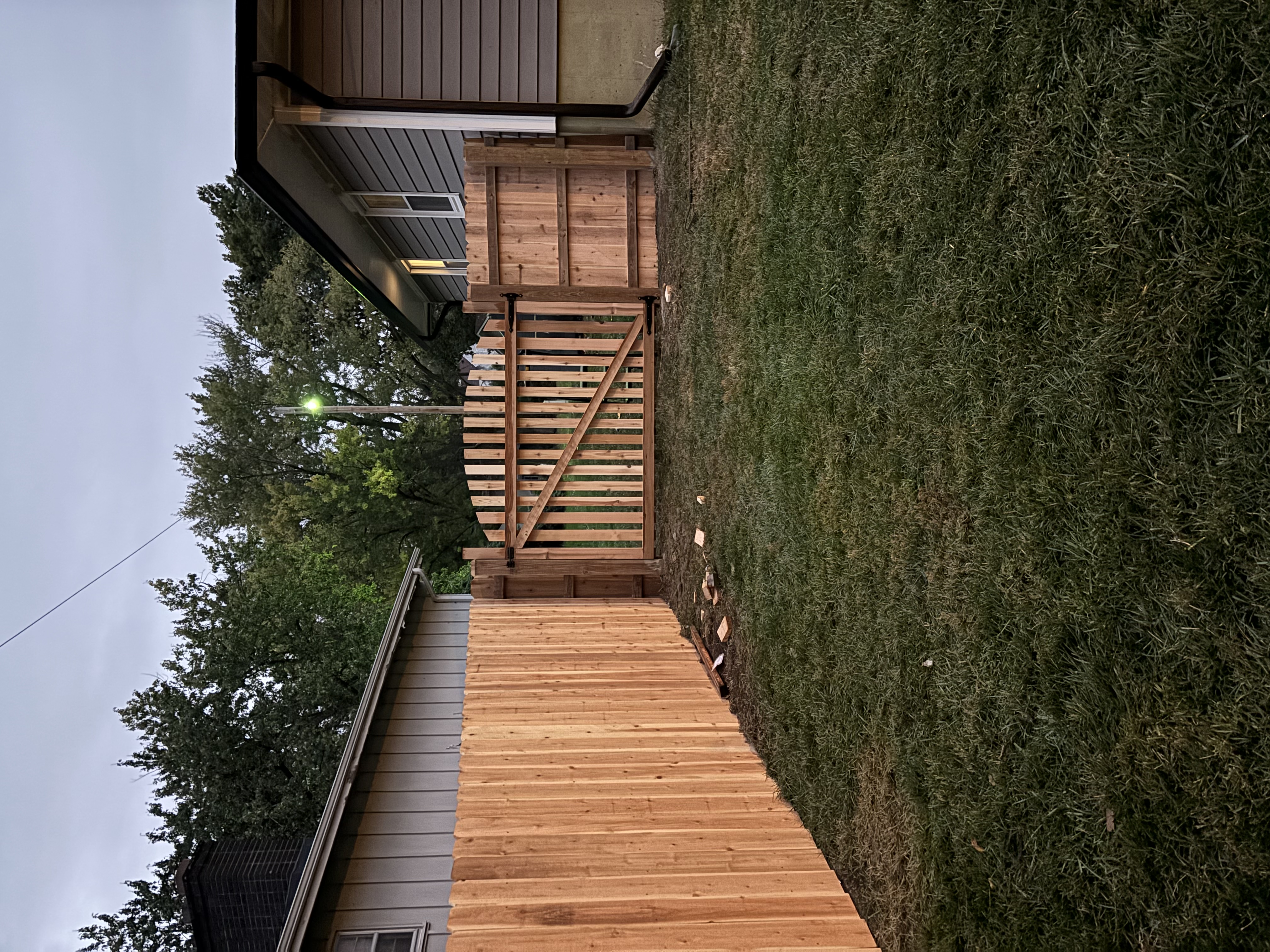 Cedar fence with arched gate